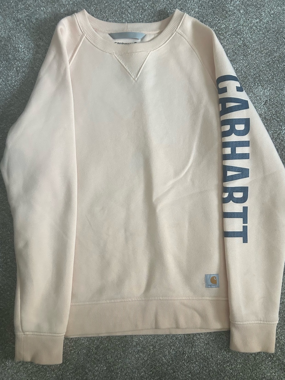 Carhartt Women's Crewneck Sweatshirt in Soft Pale Pink with Navy Sleeve Logo